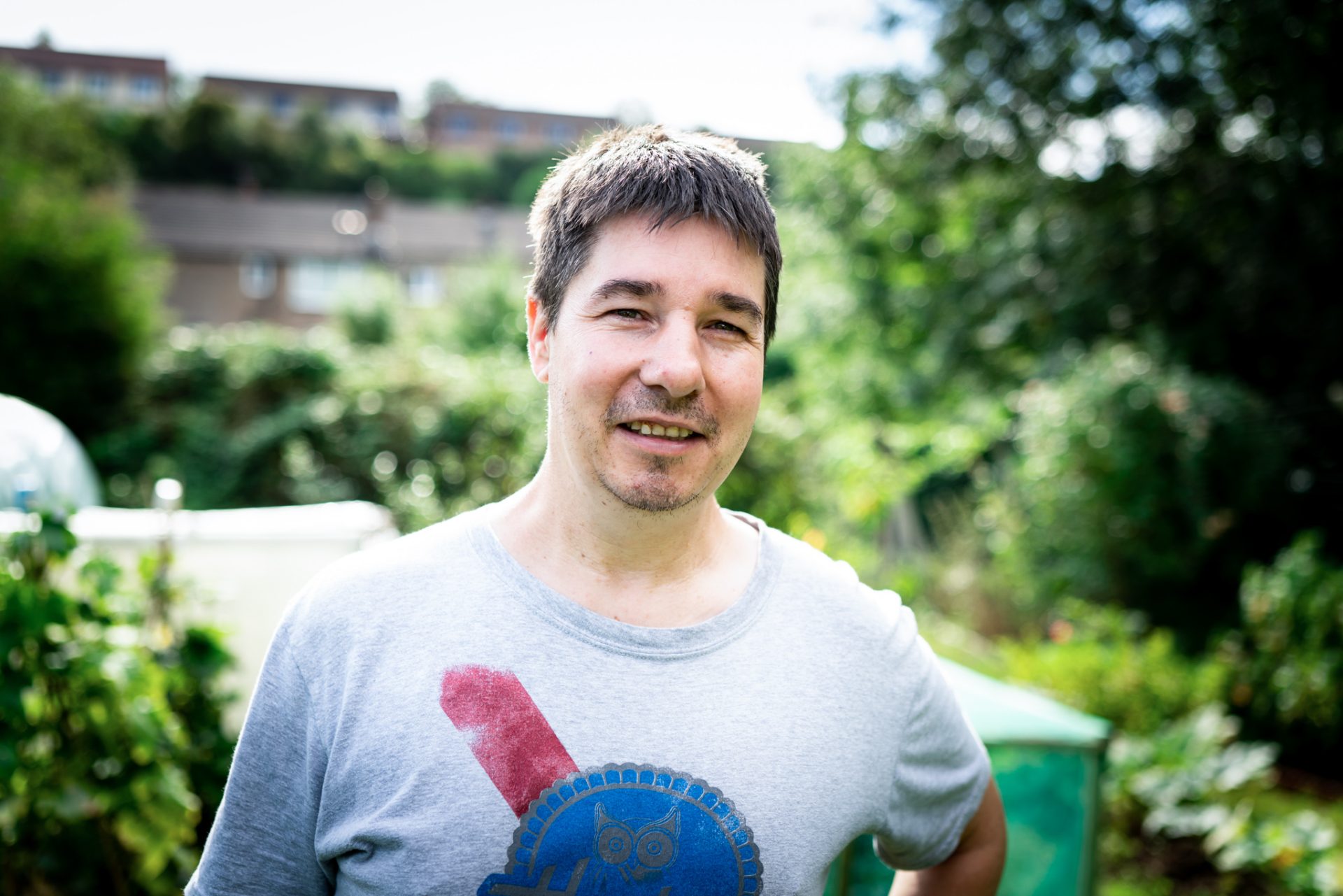 man standing in garden